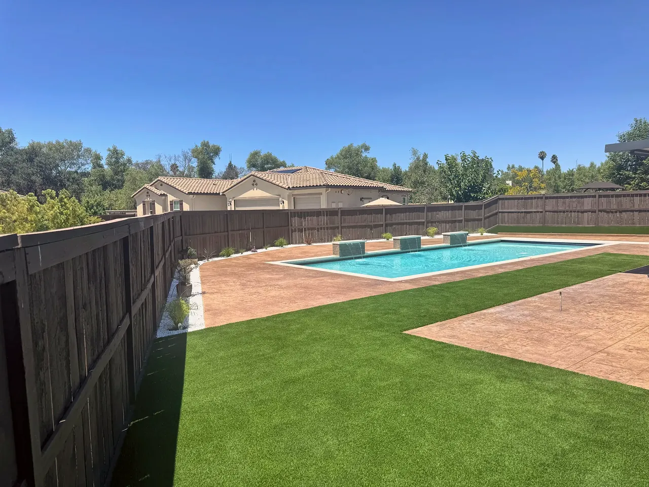The whole backyard from the side yard