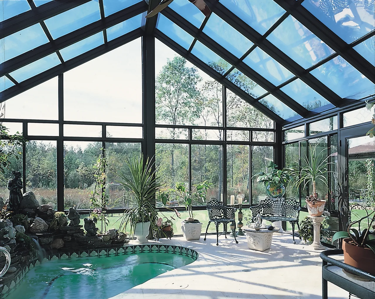 Four Seasons Cathedral sunroom with a spa inside
