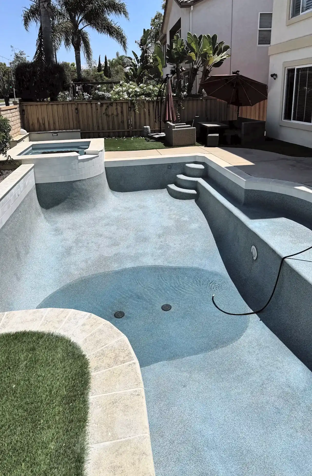 Fresh pebble finish with the pool starting to fill