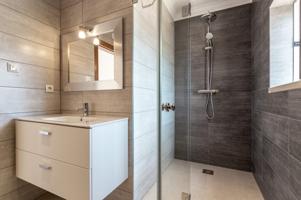 Modern bathroom with shower and washbasin